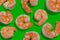Trendy sunlight Summer pattern made with shrimp on bright color background.