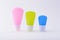 Trendy three colorful matte cosmetic tube on white background