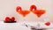 Trendy tomato martini cocktail in glasses on the table web banner