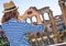 Trendy tourist woman in Rome, Italy showing heart shaped hands