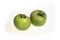 Trendy ugly food concept. Two green apples isolated on white background. Fruit with a strange shape.