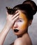 Trendy Woman with Butterfly. Creative Bright Make Up. Black Lips