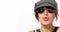 Trendy woman in chic peaked cap and sunglasses sends a kiss. Panorama banner. Close up candid portrait on white with copy space