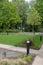 Tress, grass and streetlights in a moderns building car park