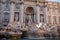 The Trevi`s Funtain, in the Center of Rome, At Sunset with Parts of it Illuminated By the Sun