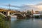 Triana Bridge and Castle of San Jorge at Guadalquivir River at sunset - Seville, Spain