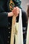 Triana nazarene, woman with rosary in her hands, brotherhood of Hope, Holy Week in Seville, Andalusia, Spain