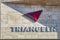 Triangeln shopping mall triangular symbol crossed by a triangular shadow on the Swedish shopping center facade. Malmo, Sweden