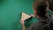 Triangle of billiard balls. A man getting ready to start a game of billiards.