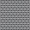 Triangle vector pattern, repeating small triangle half gray and black, rhombus shape.