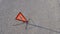 Triangle the warning triangle standing on the road