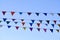 triangular colored pennant hanging in the air