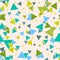 Triangular geometric seamless pattern with colorful green, blue random triangles on pastel beige background.