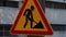 triangular road sign go construction work