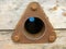 Triangular rusty metal spare part