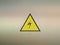 Triangular yellow flashover warning sticker