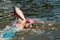 Triathlete in front crawl swimming