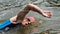 Triathlete in front crawl swimming