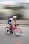 A triathlete riding hard on the cycling sector