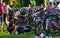 Triathlon Competitors preparing for race in compound with bicycles.