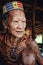 Tribal elder Toikot at his rainforest home telling a tale about the jun