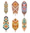 Tribal feathers with ethnic pattern. Colored decorative feathers. Boho style