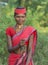 Tribal Indian woman in tradtional ethnic wear looking at camera