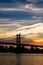 Triborough bridge and city with cloudy sunset sky