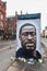 Tribute painted mural by street artist Akse of George Floyd in Northern Quarter, Manchester, England