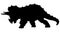 Triceratops. Ornithischian dinosaur. Huge fossil dinosaur. A silhouette of a prehistoric creature