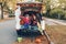 Trick or trunk. Children siblings sisters celebrating Halloween in trunk of car. Friends kids girls preparing for October holiday