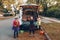 Trick or trunk. Children siblings sisters celebrating Halloween in trunk of car. Friends kids girls preparing for October holiday