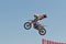Tricks on a motorcycle jump performed by the athletes during the