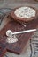 Tricolor quinoa in wooden bowl, wooden spoon