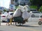 Tricycle loaded with foam waste on the road