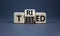Tried and tested symbol. Turned wooden cubes and changed the concept word `tried` to `tested` on a beautiful grey background.