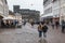 Trier, Rhineland-Palatinate - Germany - Tourists walking through the famous Porta Nigra, the Roman black city gate during rainy