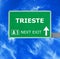 TRIESTE road sign against clear blue sky