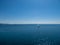 Trieste - Scenic view of a sailing boat along the coastline of the golf of Trieste in Friuli-Venezia Giulia