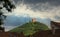 Trifels castle on the hill, dramatic sky with sunburst
