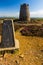 Trig point with derelict windmill, Parys Mountain.