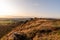 Trig point on top of The Roaches at sunset in the Peak District National Park