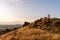 Trig point on top of The Roaches at sunset in the Peak District National Park