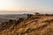 Trig point on top of The Roaches at sunset in the Peak District National Park