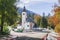 Triglav National Park, Slovenia, October 2020: Church of the Holy Spirit between the Alpine Range and Lake Bohinj in Slovenia