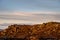 Trigonometry point on top of The Roaches at sunset in the Peak District National Park