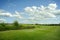 Trimmed field and sand bunkers on golf course