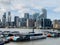 Trinity Buoy Wharf with Uber taxi boats on the River Thames in London`s Docklands.