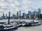 Trinity Buoy Wharf with Uber taxi boats on the River Thames in London`s Docklands.