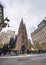 Trinity Church in Manhattan and street with tourists